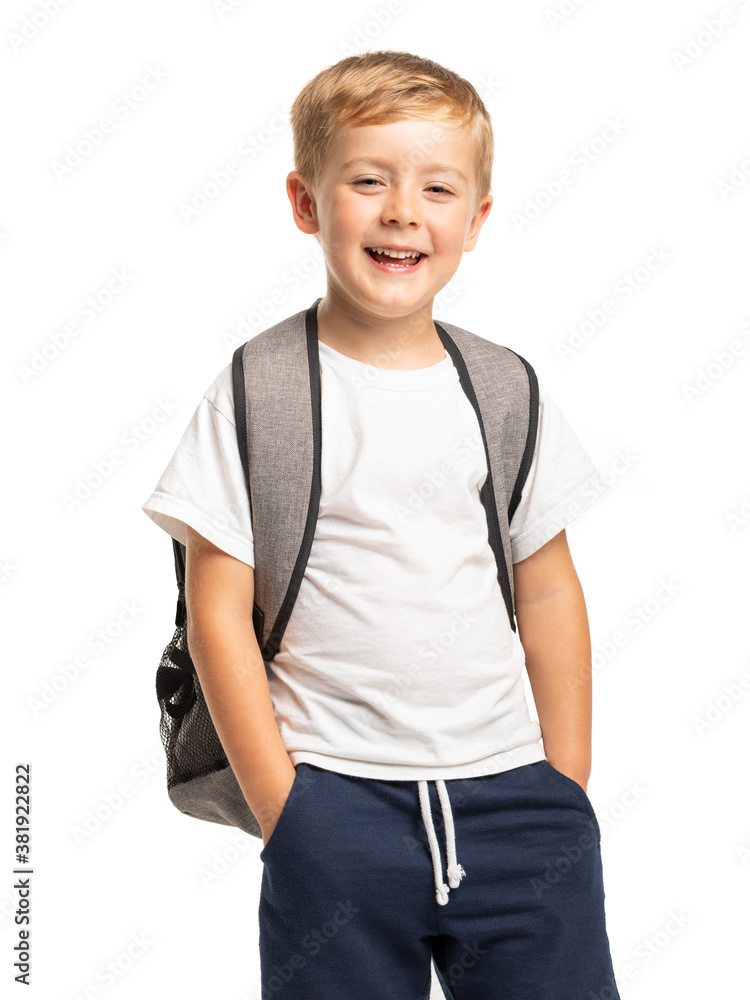 Happy smiling boy standing with backpack on white background Happy smiling boy standing with backpack on white background