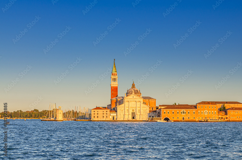 San Giorgio Maggiore island with Chiesa di San Giorgio Maggiore catholic church and campanile bell tower, Giudecca Canal of Venetian Lagoon water, Venice city, Veneto Region, Northern Italy