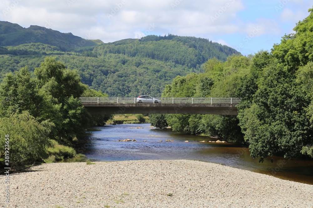 Fototapeta premium A modern bridge over the Mawddach River at Llanelltyd, Gwynedd, Wales, UK.