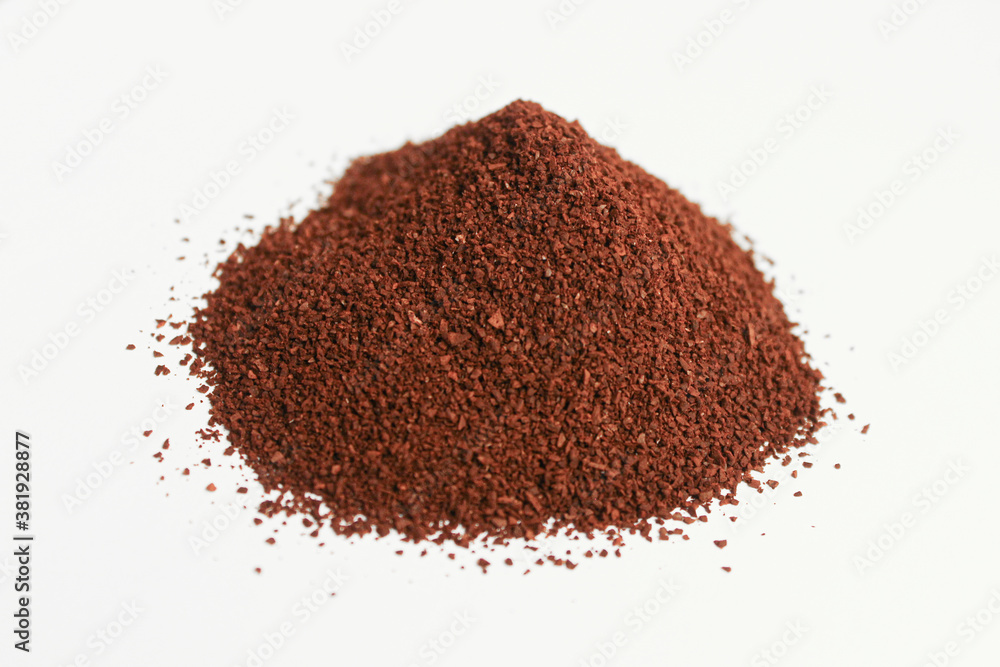 Coffee powder on white surface.