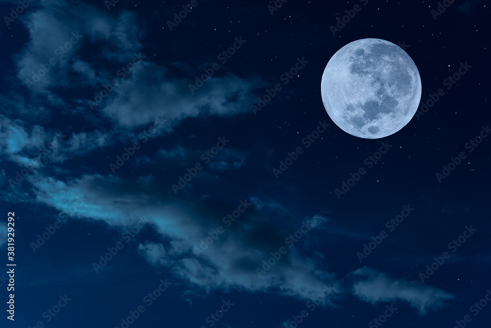 Full moon with cloud and stars on the sky.