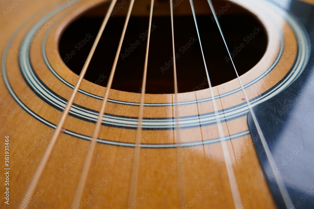 Acoustic guitar, guitar strings background. Acoustic guitar, guitar strings background.