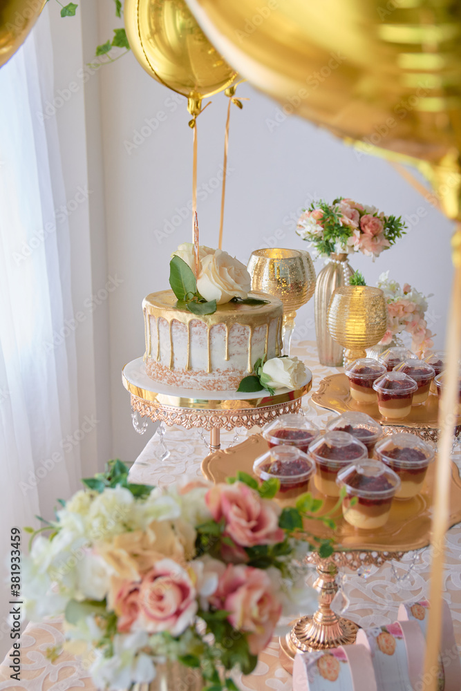 Table with desserts and cakes, decorated table for reception.