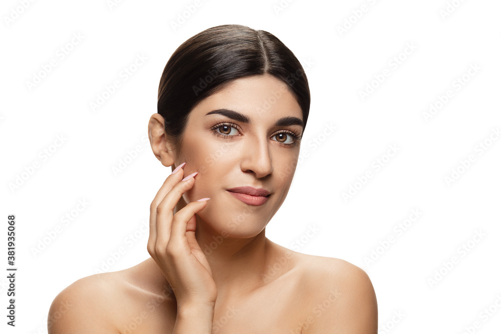 Soft touch. Portrait of beautiful jewish woman isolated on white studio background. Beauty, fashion, skincare, cosmetics, ad concept. Copyspace. Well-kept skin, natural fresh look. Healthy and shiny.