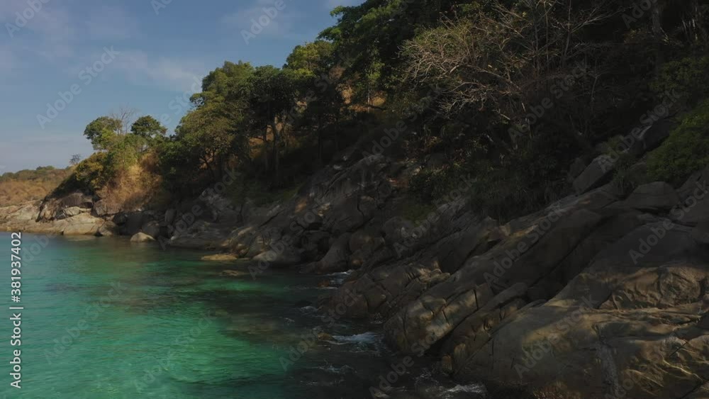 Top view of clear azure blue transparent sea with white sand. Hot sunny weather. Aerial view of the city. drone flight over the jungle and sea. overlooks the city Top view of clear azure blue transparent sea with white sand. Hot sunny weather. Aerial view of the city. drone flight over the jungle and sea. overlooks the city