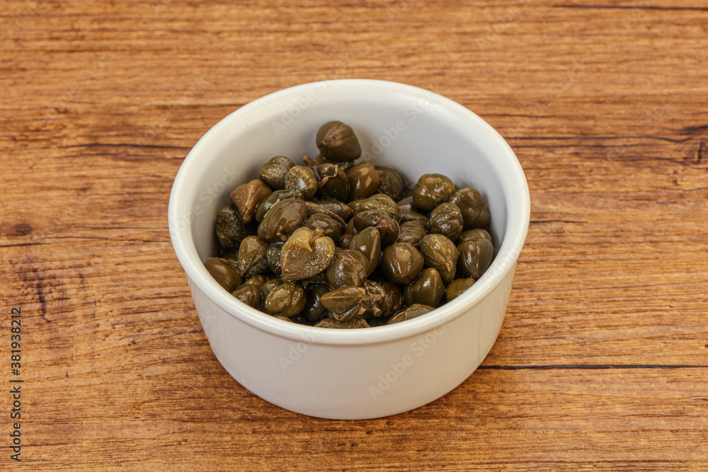 Tasty capers in the bowl Tasty capers in the bowl
