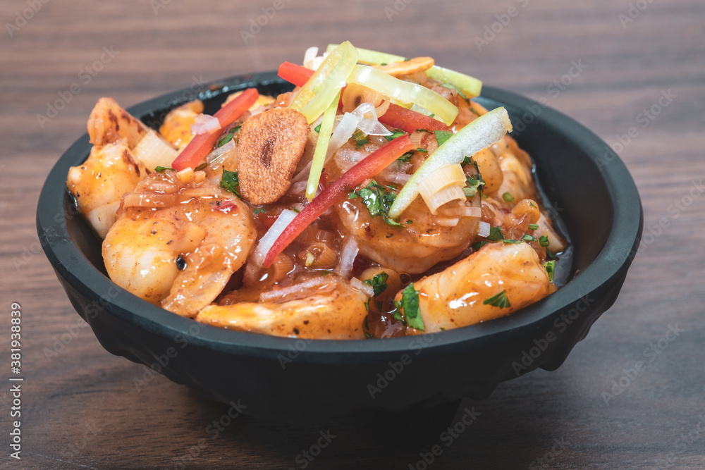 Tasty grilled shrimps with spices served on a plate Tasty grilled shrimps with spices served on a plate