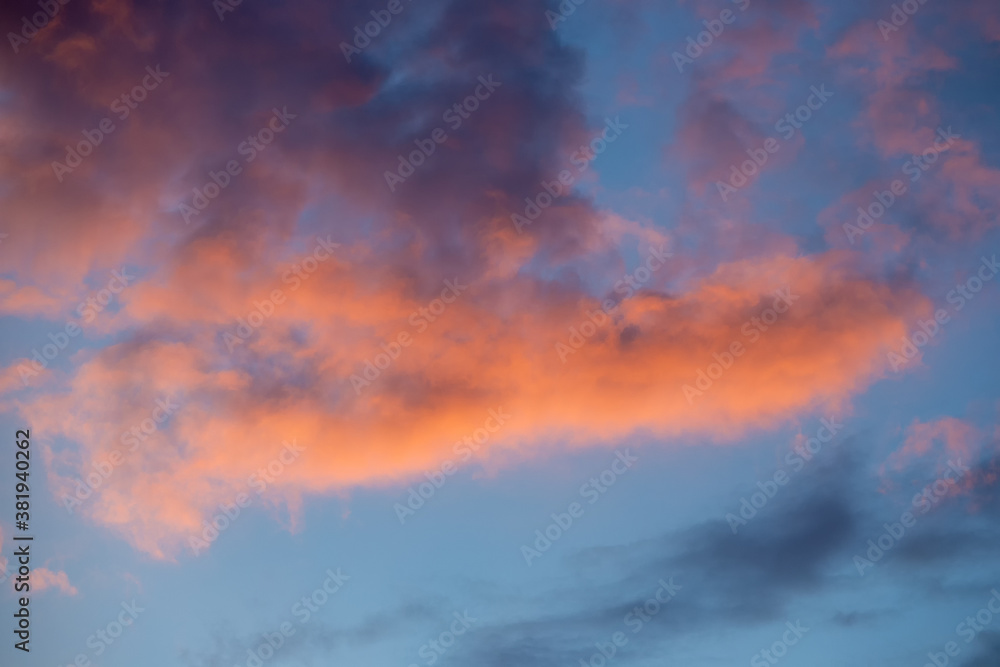 Fototapeta premium Evening sky at sunset,clouds in red and pink,autumn sky,sunset.