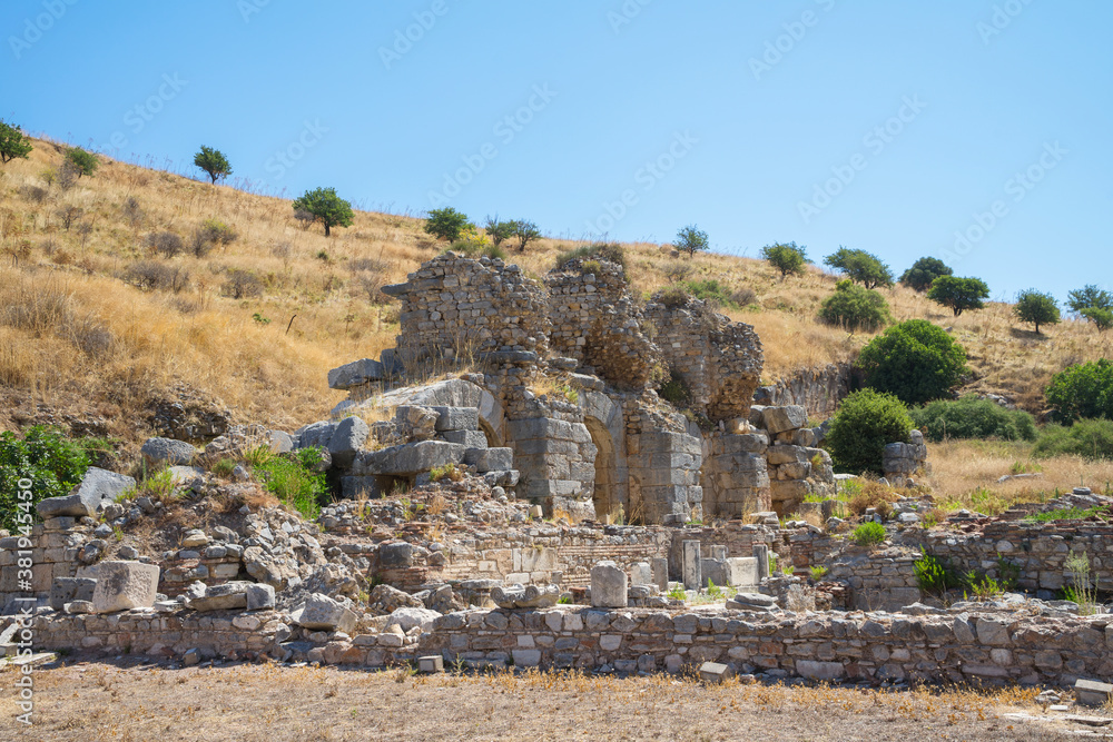 Ruins in the ancient Greek city Ephesus or Efes on the coast of Ionia in Izmir Province, Turkey in summer day