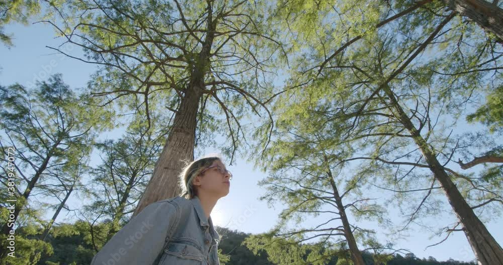wide shot a woman scientist ecologist reflects on the background of nature wide shot a woman scientist ecologist reflects on the background of nature