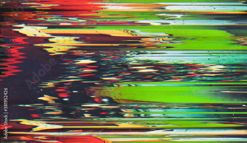 Colorful noise background. Digital distortion. Red green error artifacts on black.