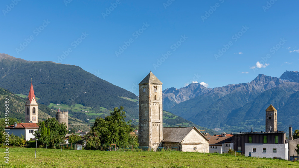 Beautiful panoramic view of the old town of Malles Venosta, against the Alps, South Tyrol, Italy