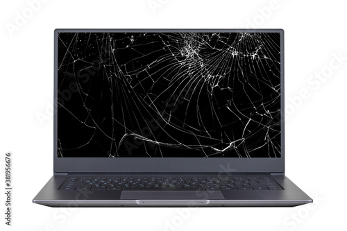 laptop with a broken, cracked screen isolated on white background close up front view