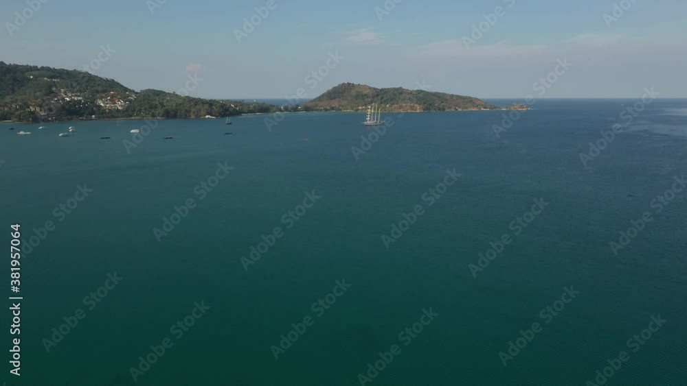 Top view of clear azure blue transparent sea with white sand. Hot sunny weather. Aerial view of the city. drone flight over the jungle and sea. overlooks the city Top view of clear azure blue transparent sea with white sand. Hot sunny weather. Aerial view of the city. drone flight over the jungle and sea. overlooks the city