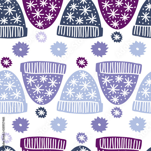 Seamless colorful vector pattern of winter blue and purple beanie hat with stars