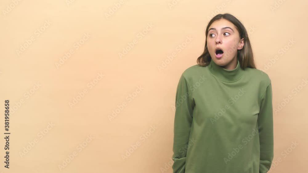 Young caucasian woman being shocked because of something she has seen Young caucasian woman being shocked because of something she has seen