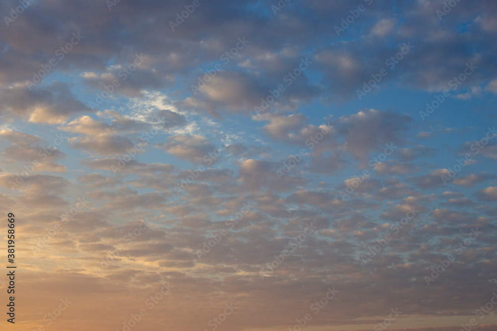 Obraz premium sunset with fluffy clouds