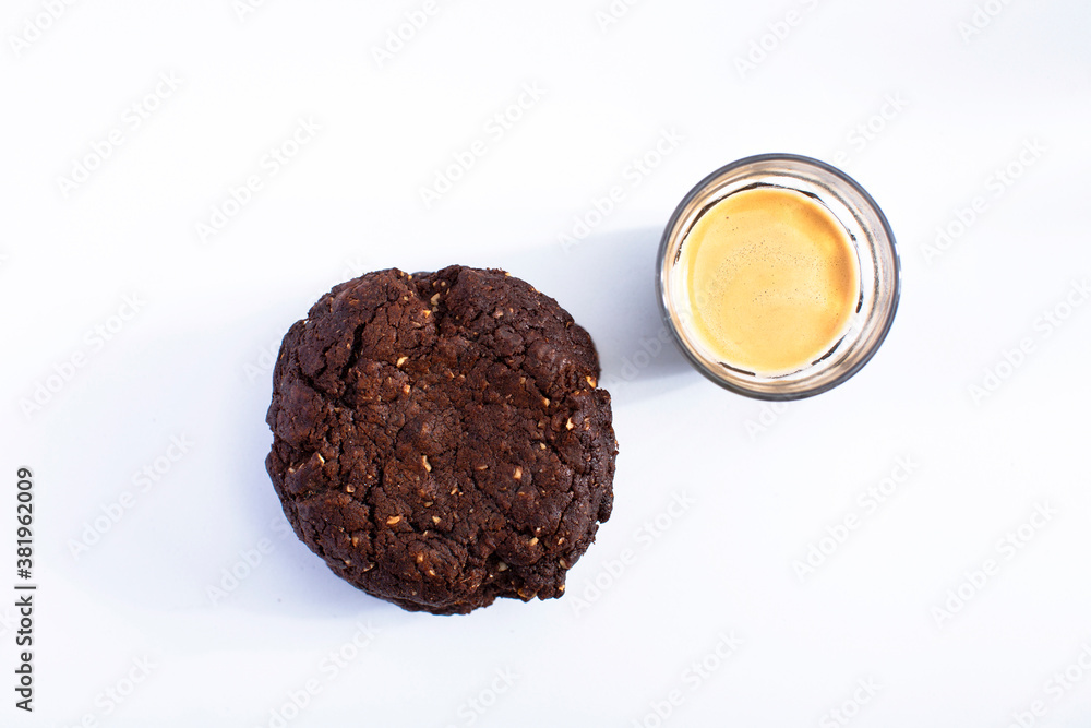 cup of coffee and chocolate cookie cup of coffee and chocolate cookie
