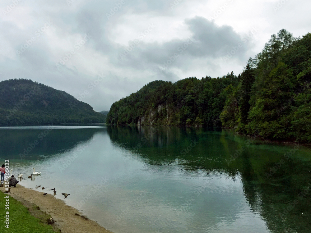 lake and mountains at cloudy day in Munich, Germany
