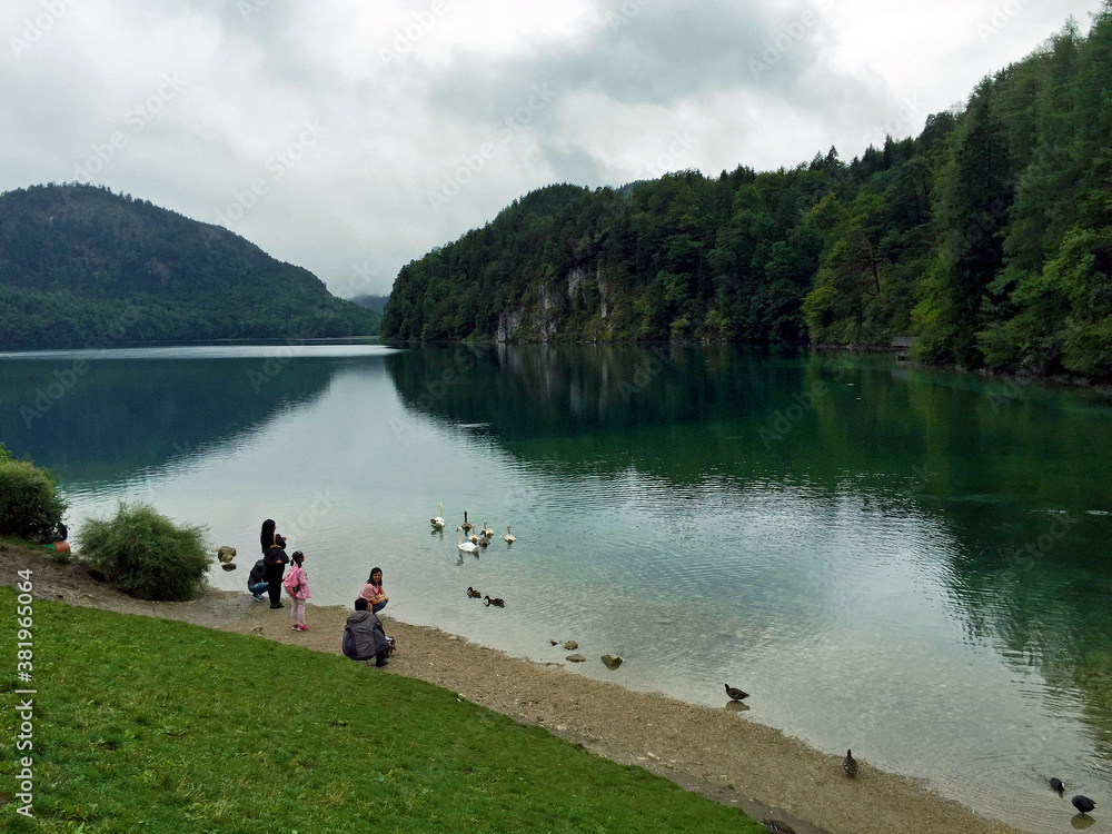 lake and mountains at cloudy day in Munich, Germany lake and mountains at cloudy day in Munich, Germany