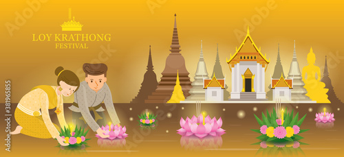 Loy Krathong Festival, Couple in Traditional Clothing with Temple Background