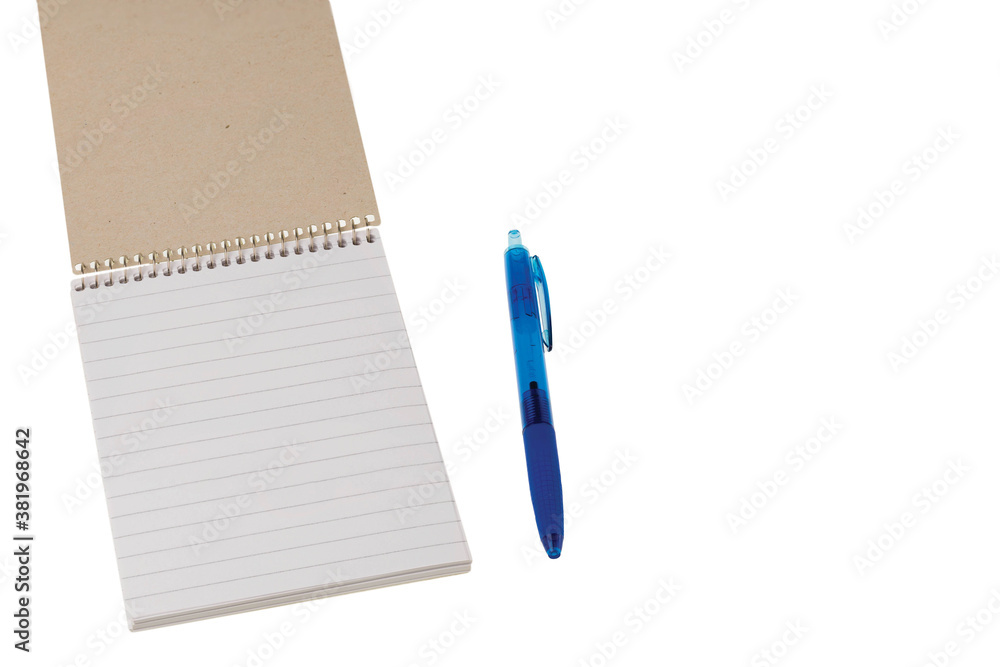 Close up view notepad and pen isolated on white background. School concept. School backgrounds. Close up view notepad and pen isolated on white background. School concept. School backgrounds.