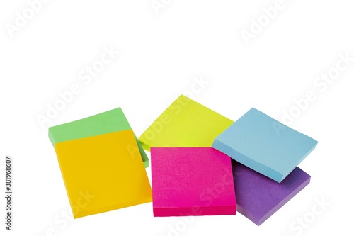 Close up view of colorful post it note isolated on white background.