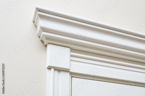 decorative elements of white door in the classical style