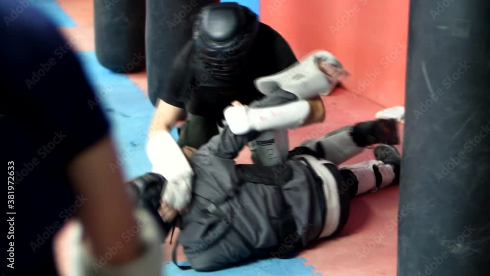 Two mans fighting hand to hand combat Two mans fighting hand to hand combat