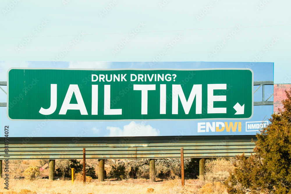 A billboard about jail time and drunk driving along Route 66 on the Navajo Indian reservation in New Mexico.