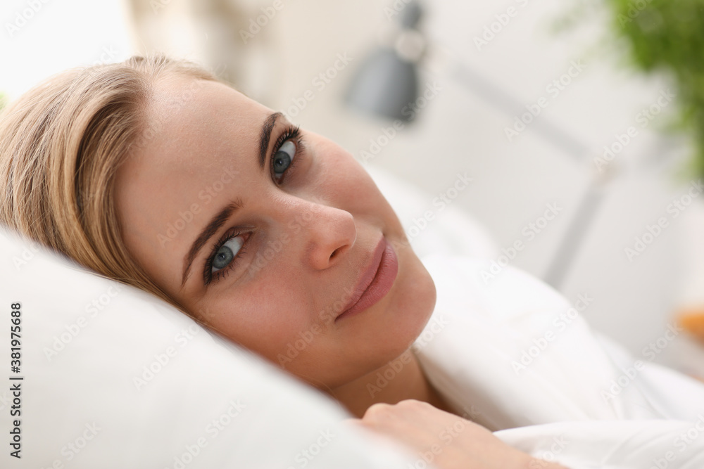 Young beautiful woman waking up in the morning concept Young beautiful woman waking up in the morning concept