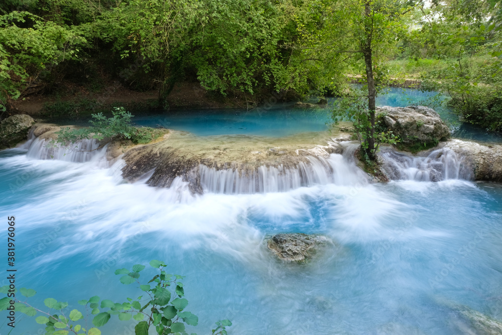 frontal waterfalls produced elsa river in the colle di val d'elsa river park tuscany italy frontal waterfalls produced elsa river in the colle di val d'elsa river park tuscany italy
