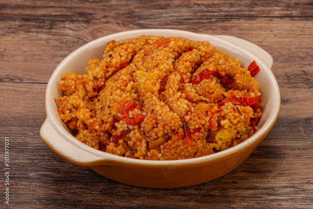 Couscos with tomato and chicken Couscos with tomato and chicken