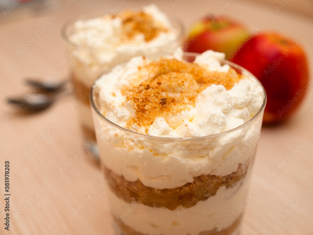 Tilslørte bondepiker - Norwegian dessert with apples and whipped cream Tilslørte bondepiker - Norwegian dessert with apples and whipped cream