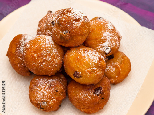 Fritole - Italian doughnuts with raisins photo