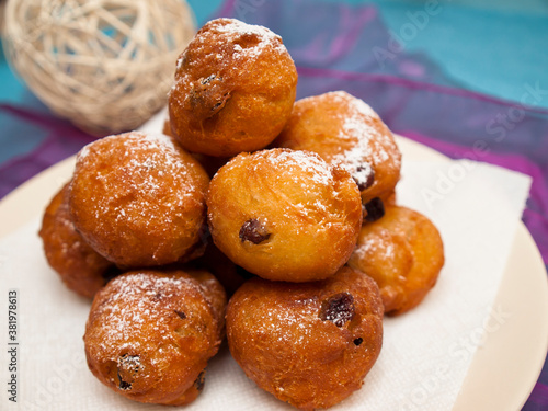 Fritole - Italian doughnuts with raisins photo