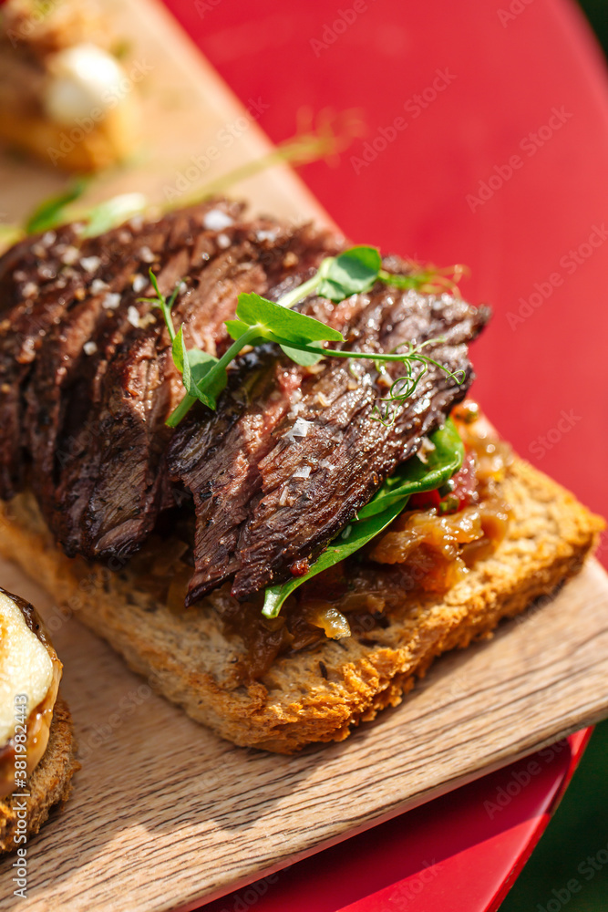 Spanish tapas with roasted beef on toast