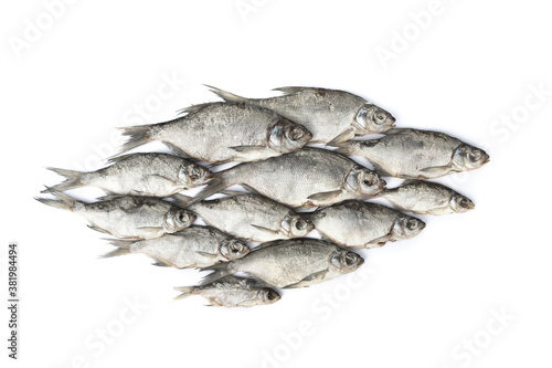 Top view of dried salted fish isolated on white background. Beer snack.