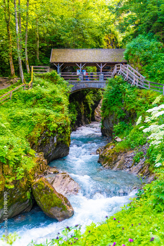 Entrance Bridge to Sigmund Thun Gorge. Cascade valley of wild Kapruner Ache near Kaprun, Austria photo