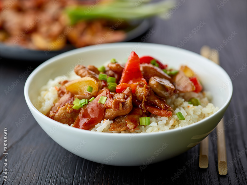 fried rice and vegetables with hot chicken sauce