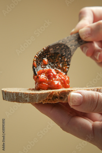 Roasted vegetable spread with bread. Homemade food concept. photo