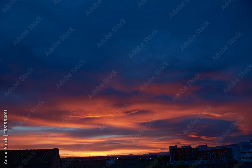 Fototapeta premium Clouds during sunset, orange