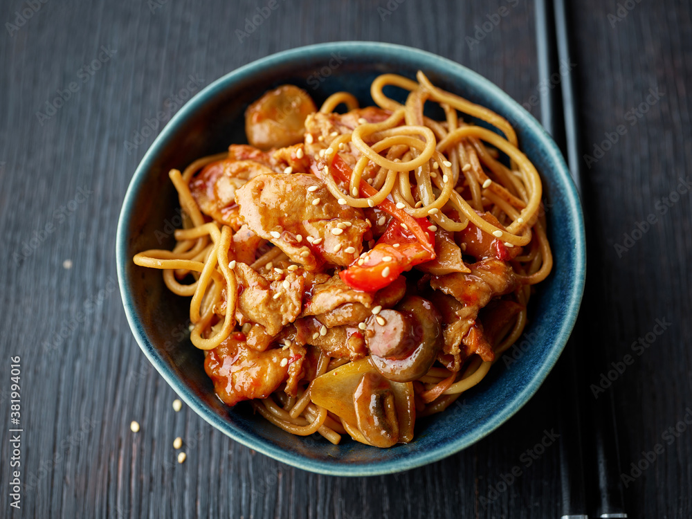 fried noodles and vegetables with hot chicken sauce fried noodles and vegetables with hot chicken sauce