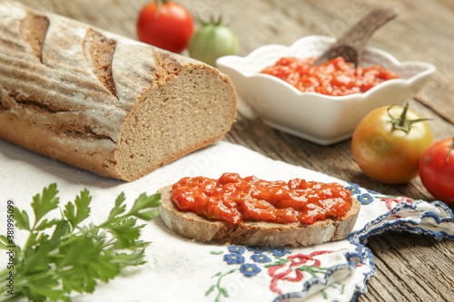 Roasted vegetable spread with bread. Homemade food concept. photo