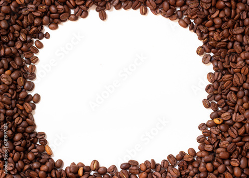 Frame made of coffee beans. Pattern from roasted coffee beans. Template coffee pad.
