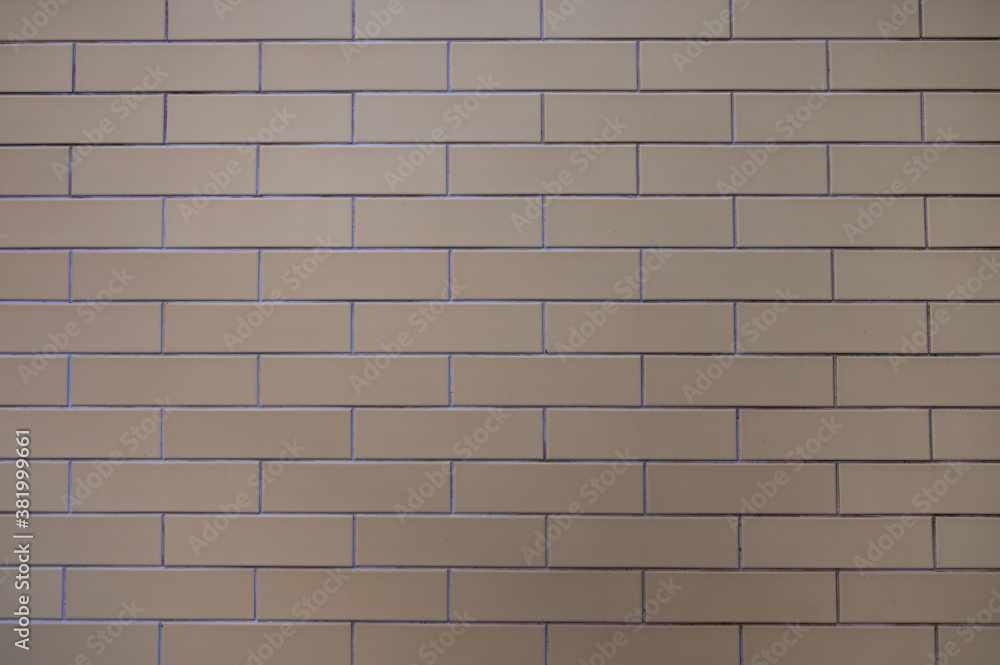 Obraz premium Background wall of modern grey bricks fastened with cement, horizontal orientation