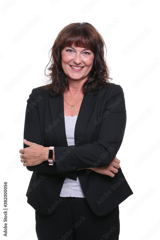 Beautiful mature woman in front of a background Beautiful mature woman in front of a background