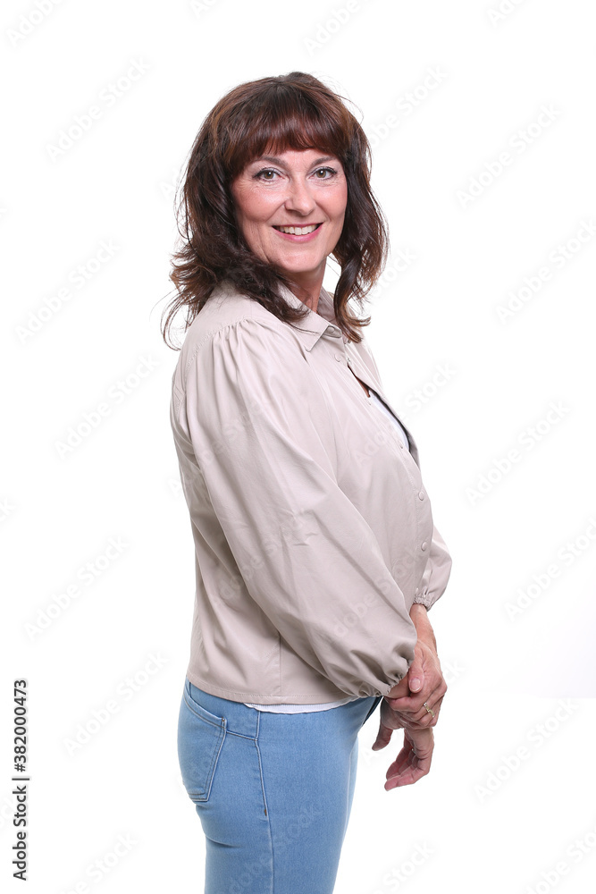 Beautiful mature woman in front of a background Beautiful mature woman in front of a background