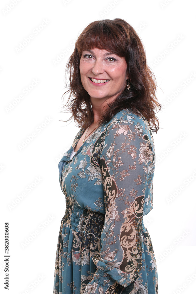Beautiful mature woman in front of a background Beautiful mature woman in front of a background