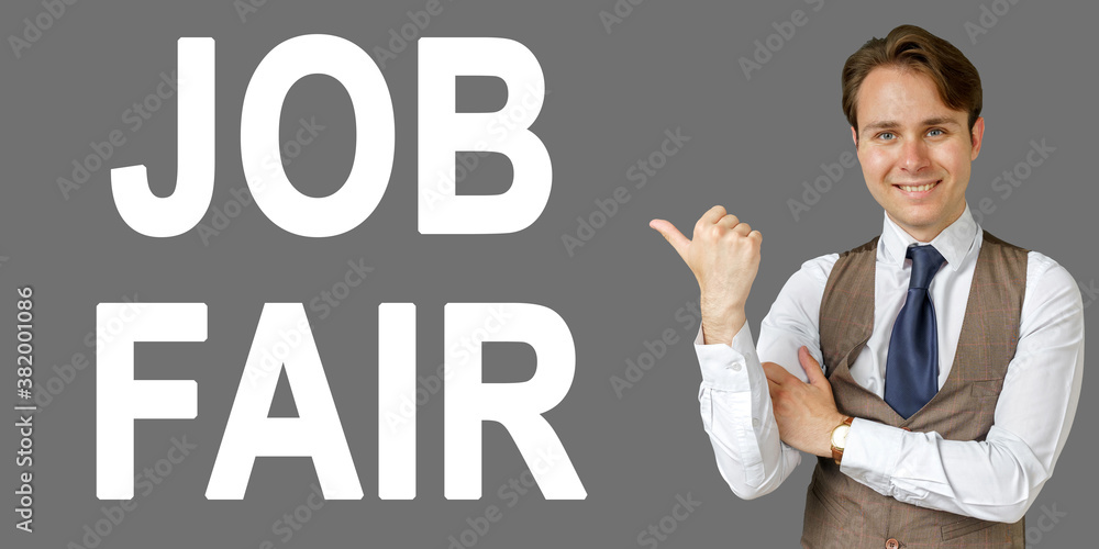 Emotional portrait of businessman showing right hand gesture on text - JOB FAIR. Gray background. Emotional portrait of businessman showing right hand gesture on text - JOB FAIR. Gray background.